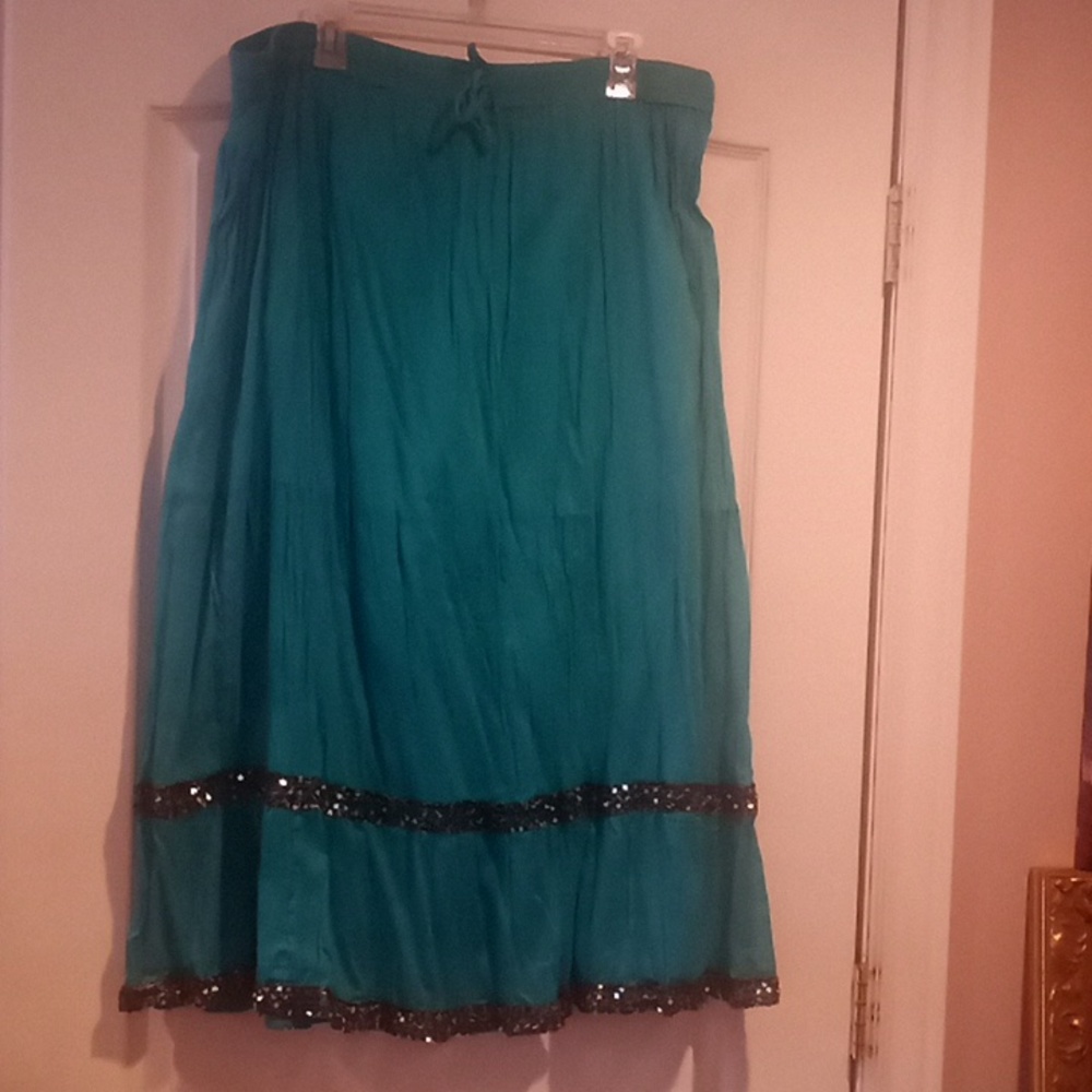 Turquoise long skirt, Sparkly sequin detail on the bottom size large